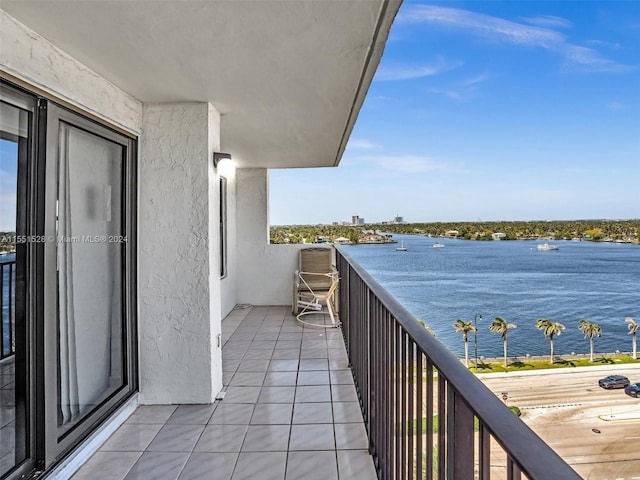 balcony featuring a water view