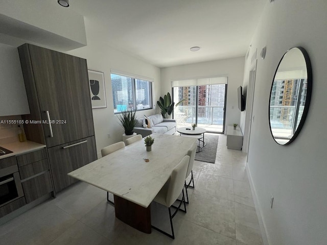 dining room with light tile floors