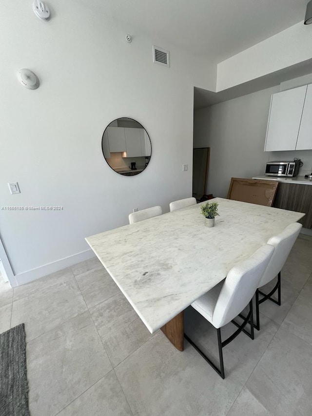 view of tiled dining room