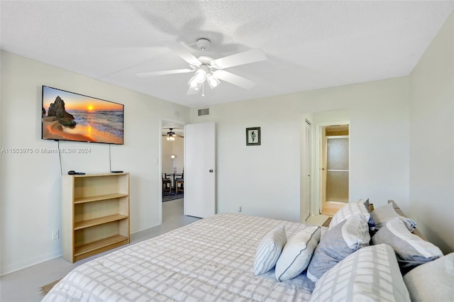 bedroom with concrete floors and ceiling fan