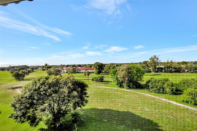 birds eye view of property with a rural view