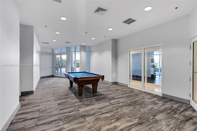 recreation room featuring plenty of natural light, dark hardwood / wood-style flooring, and billiards