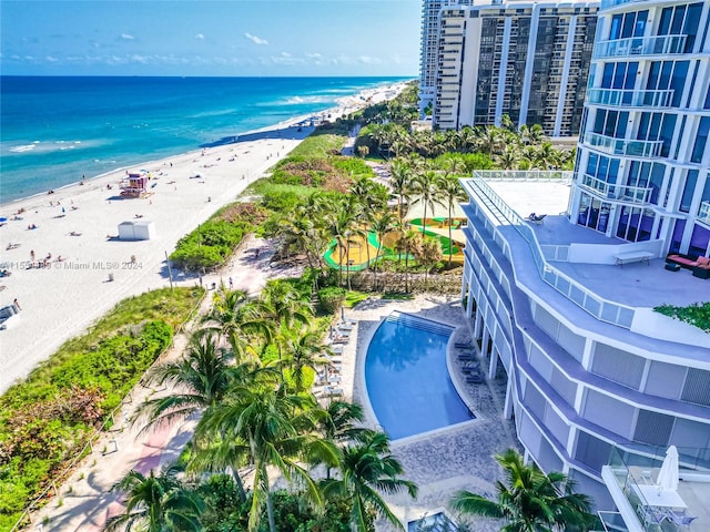 drone / aerial view with a view of the beach and a water view