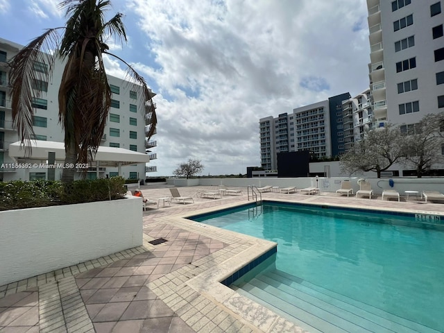 view of pool with a patio area