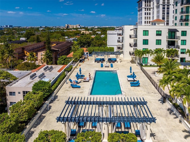 view of pool with a pergola and a patio area