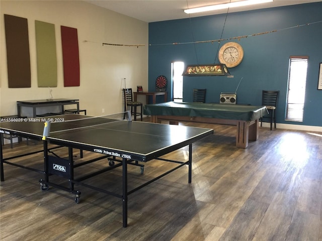 game room with wood-type flooring and billiards