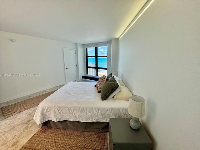 bedroom with a water view