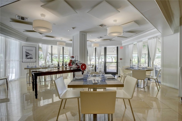 dining space featuring light tile patterned floors