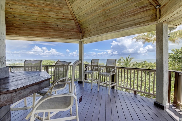 deck with a water view and a gazebo