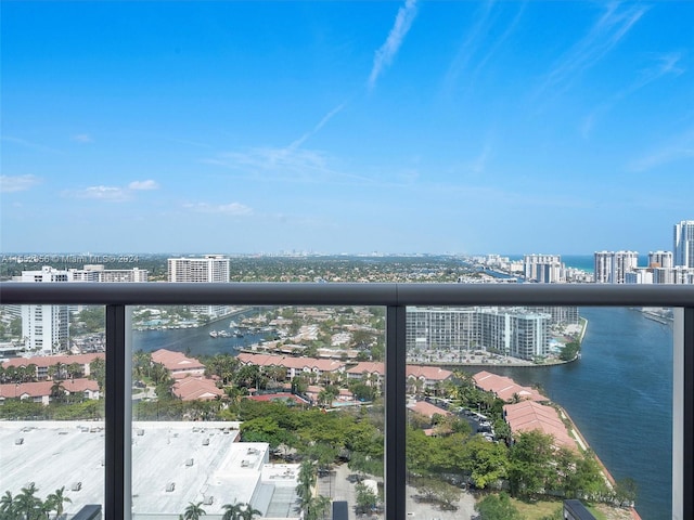 balcony featuring a water view