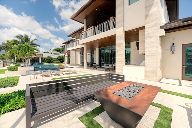 view of patio / terrace featuring a balcony