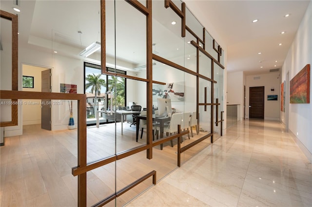 corridor with a tray ceiling