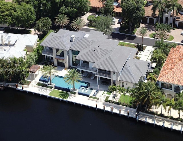 drone / aerial view with a water view