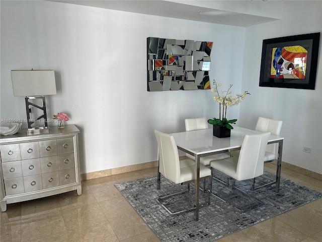 801 Brickell Key Blvd Unit 1610, Miami, FL 33131 - dining space featuring baseboards and tile patterned floors