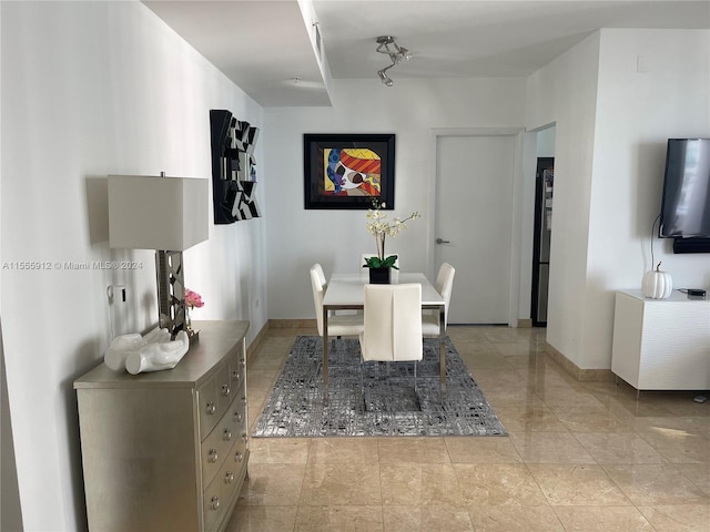 801 Brickell Key Blvd Unit 1610, Miami, FL 33131 - dining area featuring baseboards