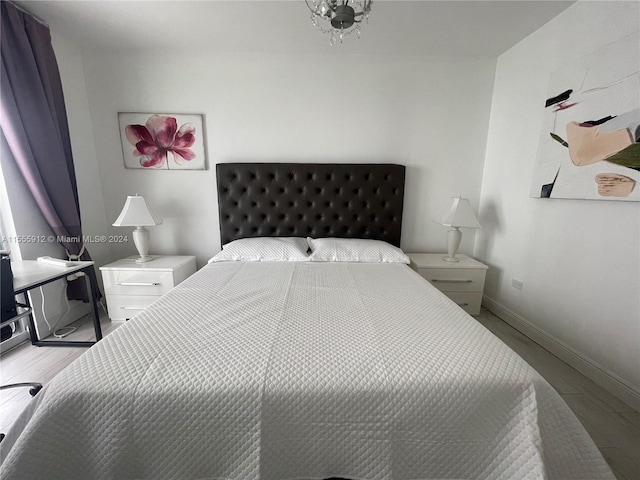 801 Brickell Key Blvd Unit 1610, Miami, FL 33131 - bedroom with wood finished floors and baseboards