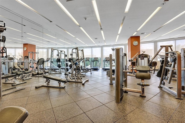 gym featuring floor to ceiling windows