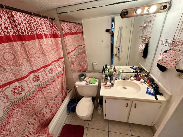 full bathroom featuring toilet, a textured ceiling, vanity, shower / tub combo with curtain, and tile floors