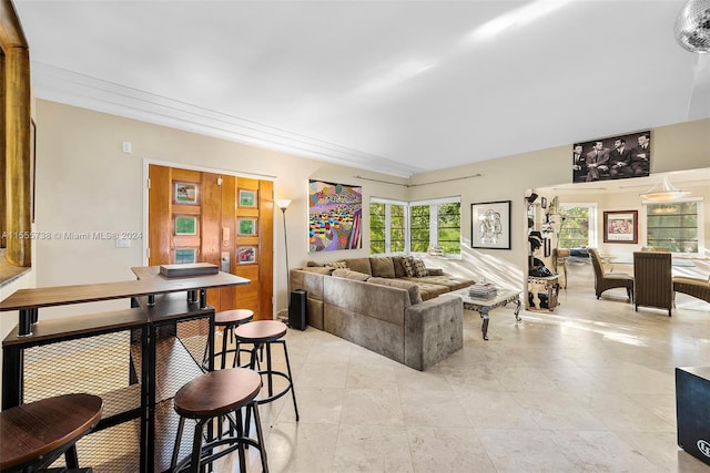 living room with light tile patterned flooring