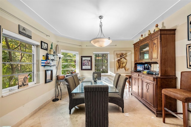 3440 N Meridian Ave, Miami Beach, FL 33140 - dining area featuring light tile patterned floors and baseboards
