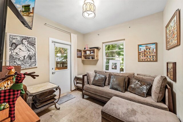 living room featuring plenty of natural light