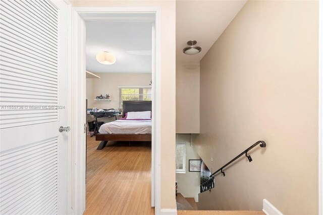 corridor featuring light hardwood / wood-style floors