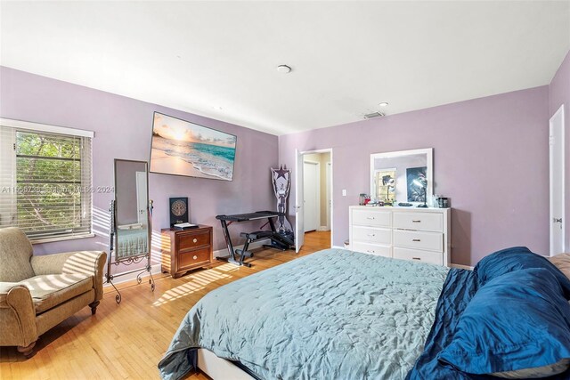 bedroom featuring light wood-type flooring