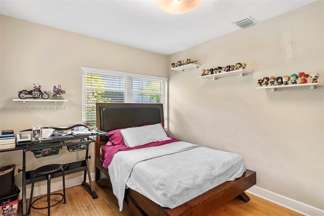 bedroom featuring light wood-type flooring