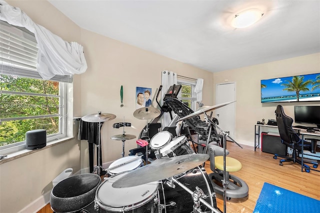 3440 N Meridian Ave, Miami Beach, FL 33140 - interior space featuring baseboards and wood finished floors