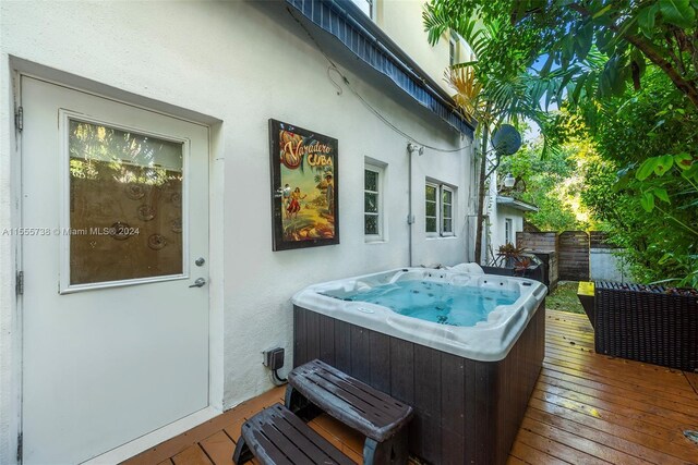 exterior space featuring a hot tub