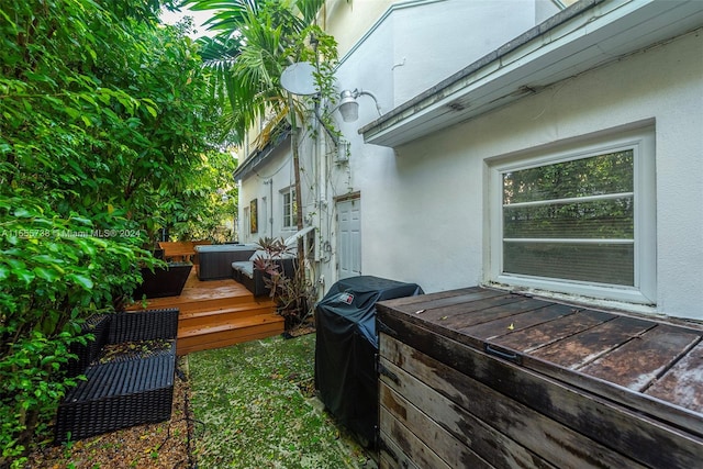 3440 N Meridian Ave, Miami Beach, FL 33140 - view of home's exterior with stucco siding and a deck