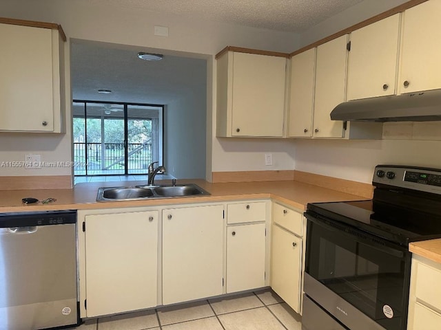 kitchen with stainless steel dishwasher, black electric range oven, a textured ceiling, sink, and white cabinetry