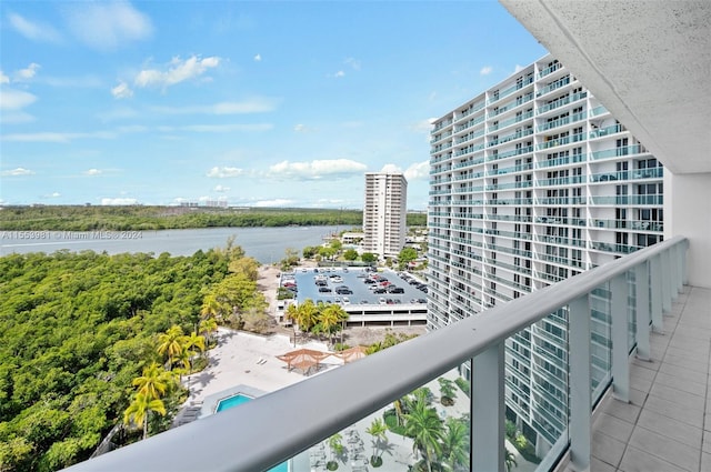 balcony featuring a water view