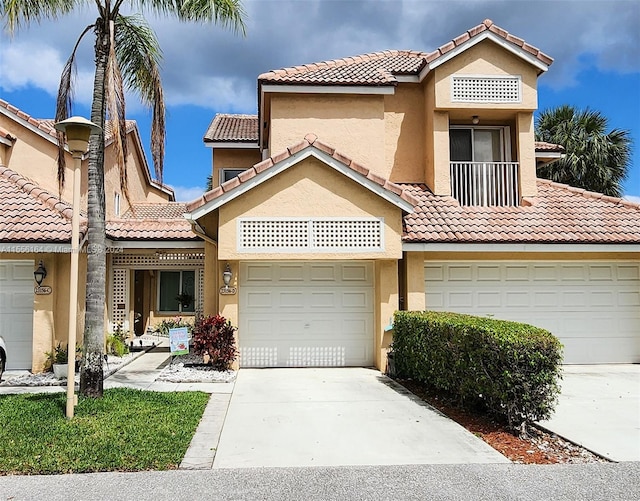 view of front of property with a garage