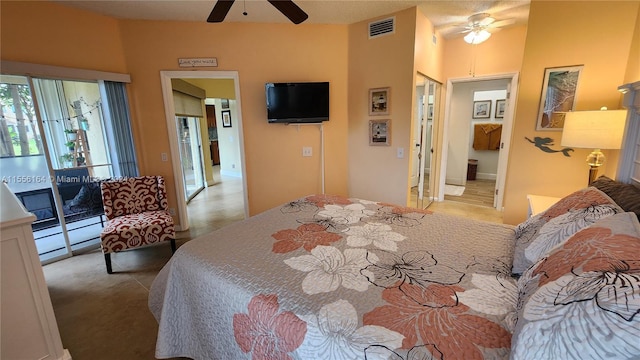 bedroom with a closet, ceiling fan, and light tile patterned floors