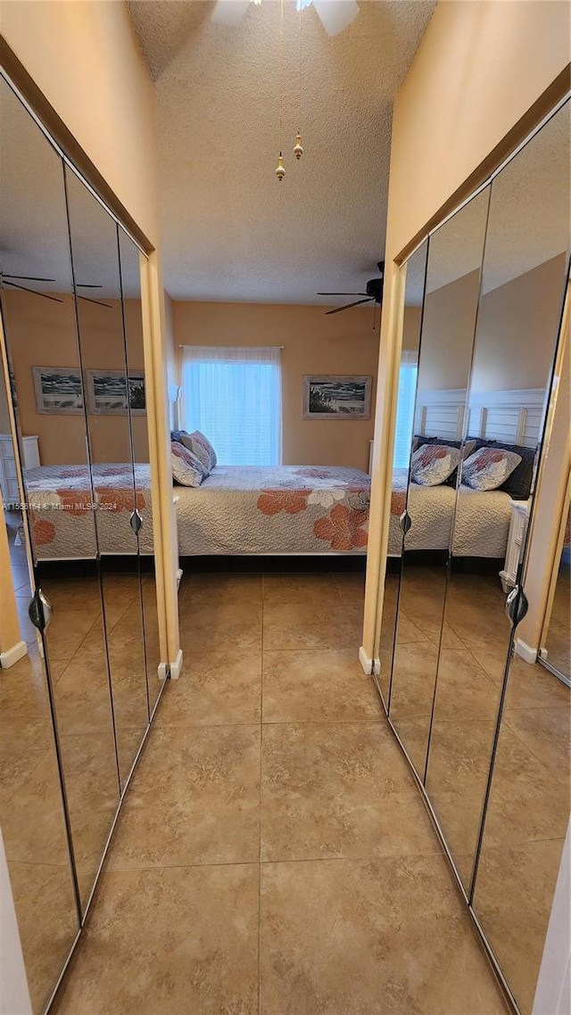 full bathroom with hardwood / wood-style floors, toilet, tiled shower / bath combo, and vanity