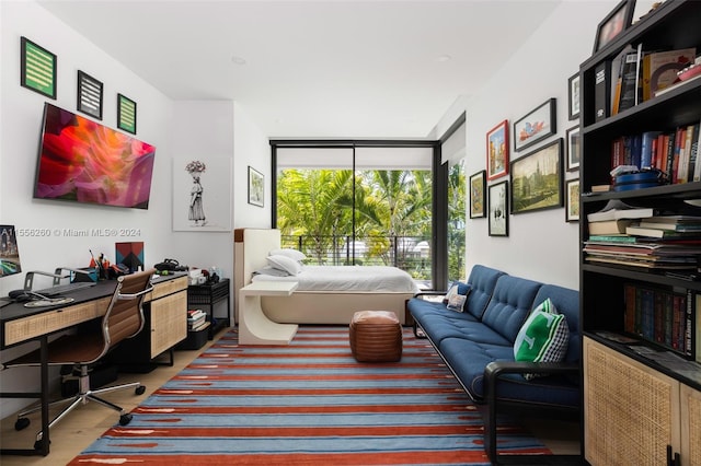 home office featuring hardwood / wood-style flooring