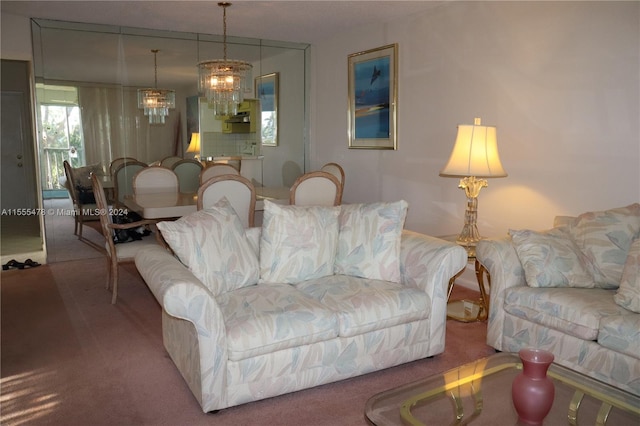 carpeted living room with a chandelier