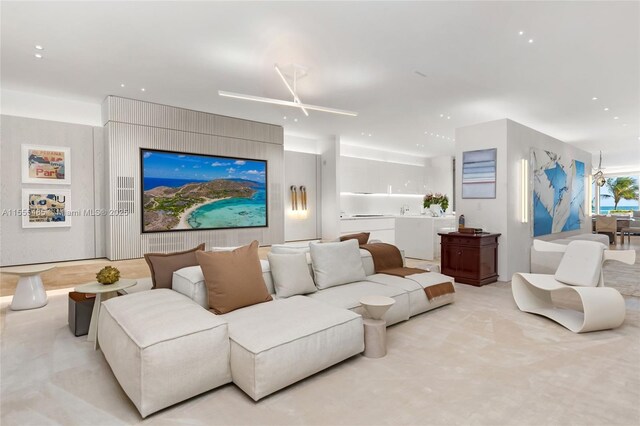 sitting room featuring light hardwood / wood-style flooring and a wealth of natural light