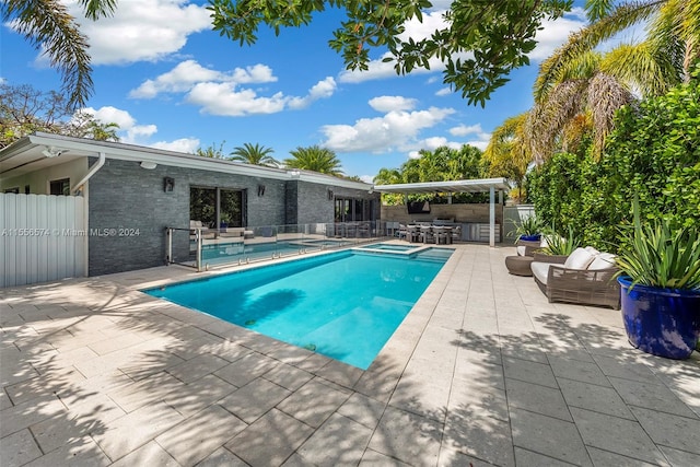 view of swimming pool featuring a patio