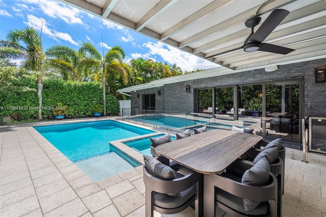 view of pool featuring a patio area and ceiling fan