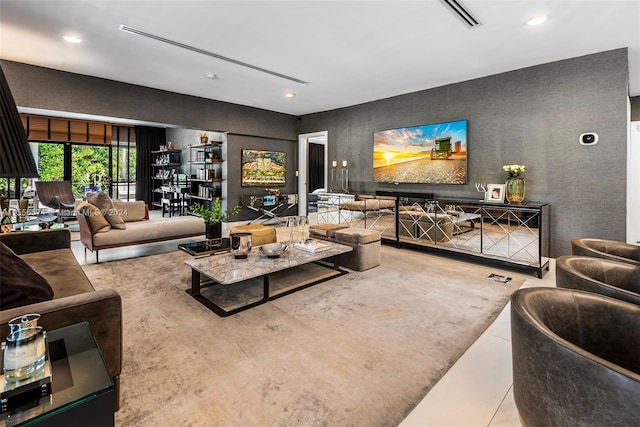 living room with tile patterned floors