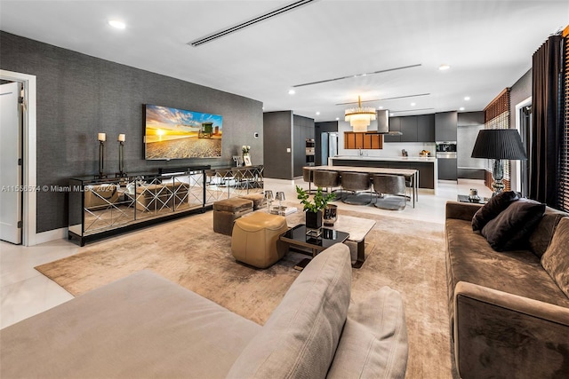 living room with an inviting chandelier