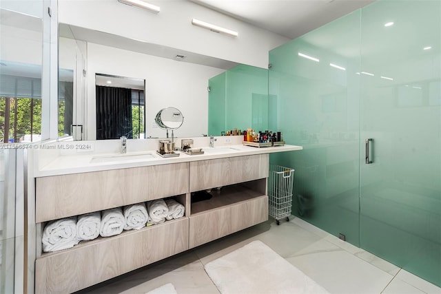 bathroom featuring vanity and an enclosed shower