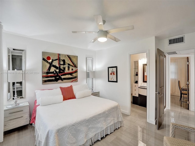 bedroom with ceiling fan and ensuite bathroom