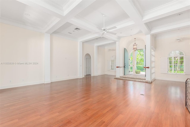 unfurnished living room with ceiling fan, beam ceiling, light hardwood / wood-style floors, and coffered ceiling