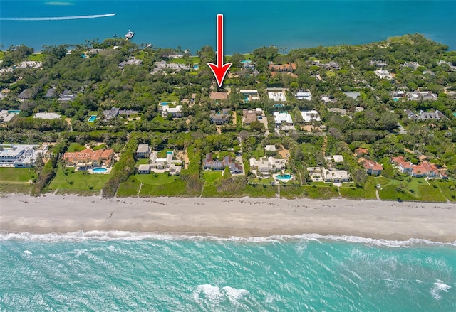 aerial view with a view of the beach and a water view