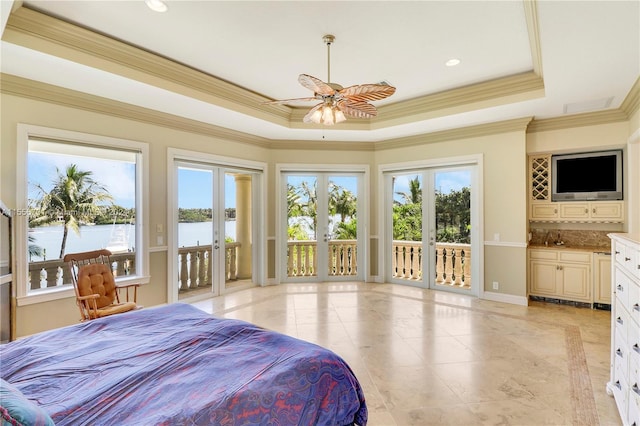 bedroom with a tray ceiling, a water view, light tile floors, access to outside, and french doors