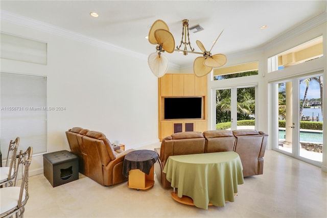 living room featuring a chandelier, ornamental molding, light tile floors, and french doors