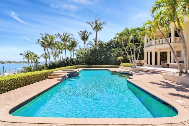 view of swimming pool featuring a patio